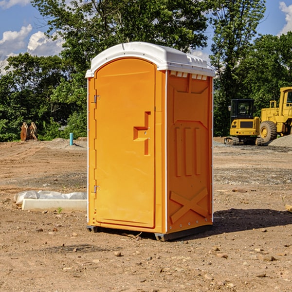 what is the cost difference between standard and deluxe portable restroom rentals in Caraway